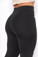 Calça legging feminina preta para academia e looks casuais